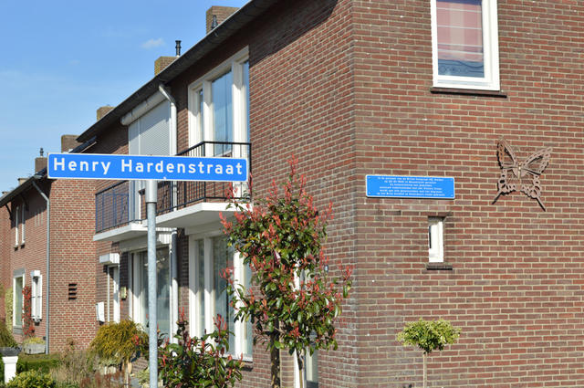Street sign and wall plaque for Henry Eric Harden VC
