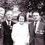 Maj. James Dunning, Capt. Donald Gilchrist, and Capt. Eric Cross MBE with their wives