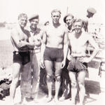 Bdr. John William ‘Jack’ White (left), Pete Smith (centre), and others from No.2 Commando