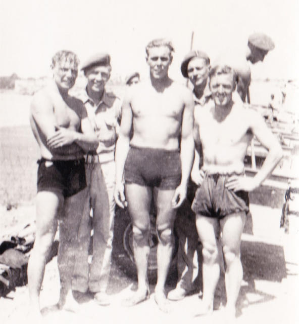 Bdr. John William ‘Jack’ White (left), Pete Smith (centre), and others from No.2 Commando