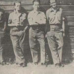 John Farrington, 2nd left, and others in captivity