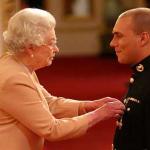 Her Majesty The Queen presents Matthew Croucher with his George Cross