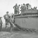 Royal Engineers climb into a Buffalo for the crossing of the Rhine 24 March 1945