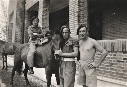Titch Dyson on horseback, L/Cpl Pedder holding horse's nose, Fred Palmer hands on hips - No 5 Commando