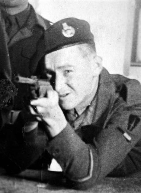 Pat Churchill firing a pistol