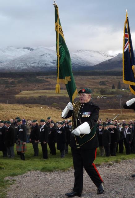 Fred Davies, CVA National Standard Bearer, leads The Colour Party.