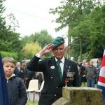 Roy Maxwell (No.4 Cdo.) at the memorial to No.4 Commando at Le Hauger Amfreville