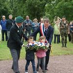 Roy Maxwell 4 Cdo laying flowers with the Mayor of Amfreville and children