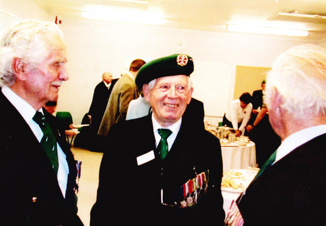 Roy Maxwell (left) of No.4 Cdo., and John Wall (centre) No.5 Cdo. 2004