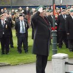 John Burn lays the wreath.