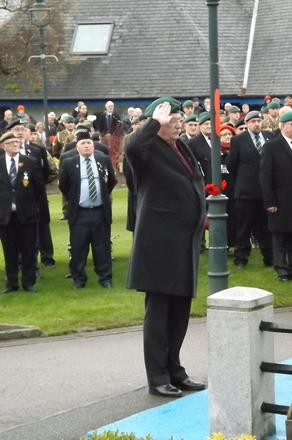 John Burn lays the wreath.