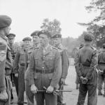 Major General Sir Robert "Lucky" Laycock , Chief of Combined Operations, talking to RM Cdos.