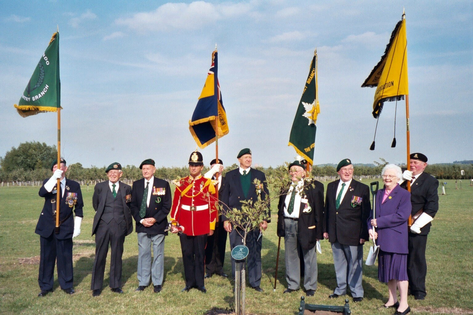 Mrs Barbara Younger plants a tree to commemorate No.5 Cdo, National Arboretum, Alrewas, June 2003.