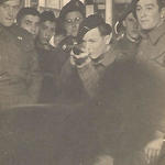 Pte. Derrick Dryden (holding rifle) and others, Brugge 4 May 1945