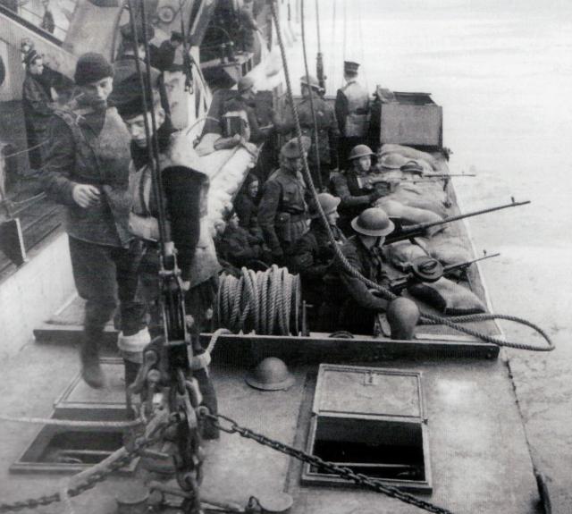 Men of No.12 Commando in an ALC being lowered in to the sea to evacuate paratroopers after the successeful Bruneval raid.