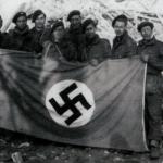 Men of the 1st Commando Brigade HQ with flag from the German HQ Wesel.