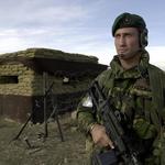 Mne. K. Rademan of 40 Commando RM on guard at Bagram Airfield, Afghanistan, February 2002.