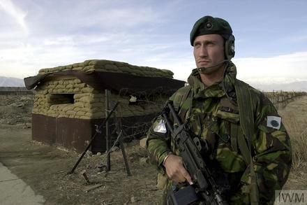 Mne. K. Rademan of 40 Commando RM on guard at Bagram Airfield, Afghanistan, February 2002.