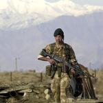 Mne. J Bridgeman of 40 Commando RM patrols at Bagram Airfield, Afghanistan, February 2002.