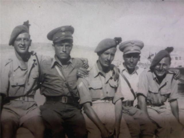 No.9 Commandos' Alec Hill, Smudger Smith, Ron 'Ken' Young with Greek officers in Greece