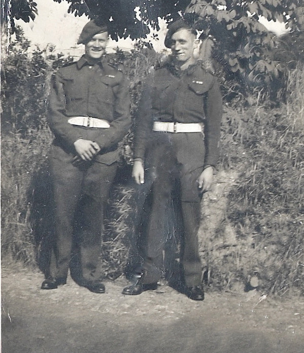 Tommy 'Paddy'  Sleith (on the right), No.9 Commando, and another