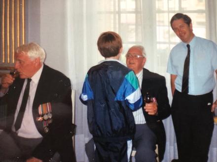 Harold Smedley 47RM Cdo talking to the young boy