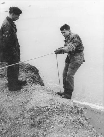 Cpl Dave Pendleton RM (Climbing Team) supervising Recruit on Jenny Cliff