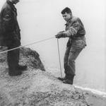 Cpl Dave Pendleton RM (Climbing Team) supervising Recruit on Jenny Cliff