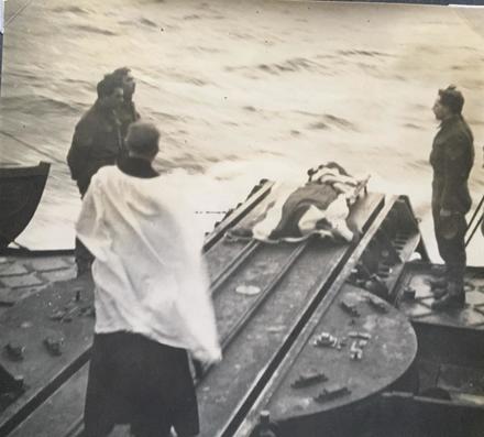 HMS Kenya. Burial at sea of LCpl Alan Carlisle No.3 Commando